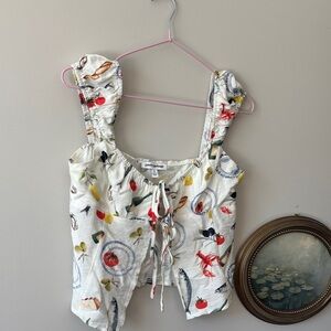 Tie-front blouse, food and wine themed print.